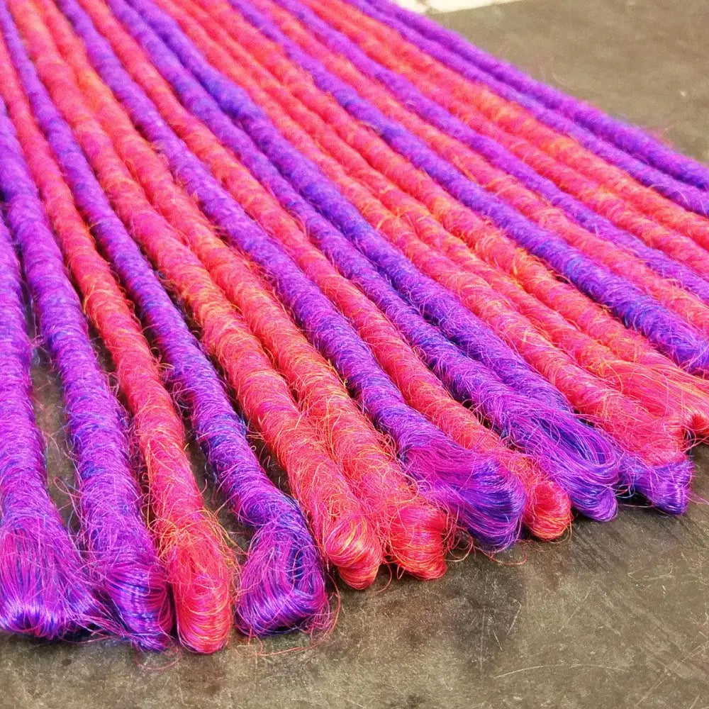 Hot pink and bright purple synthetic dreadlocks backcombed formed and single end loop top