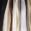 Close up of variety of hair extension color swatches included on Bliss ring