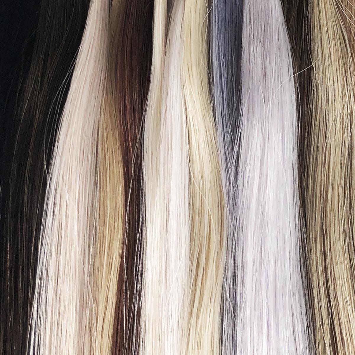 Close up of variety of hair extension color swatches included on Bliss ring