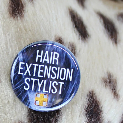 Hair Extension Stylist button with Doctored Locks logo close-up