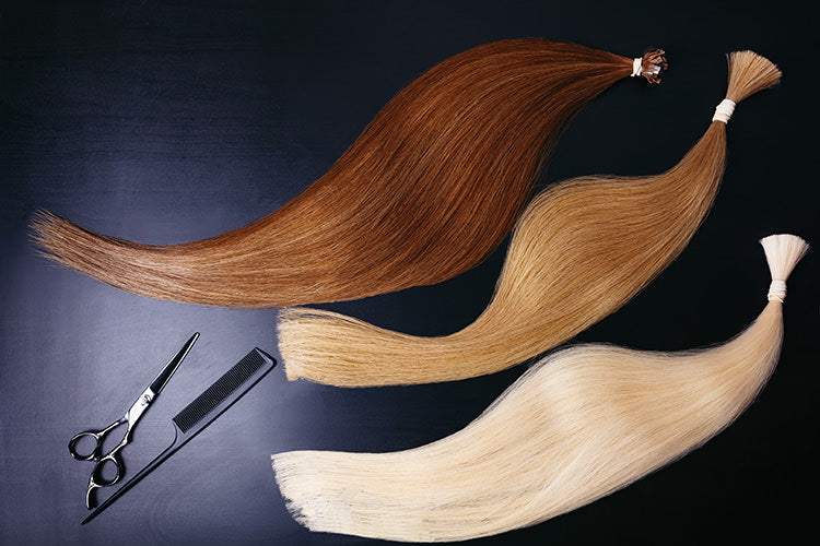 hair extension bundles on a counter with sheers