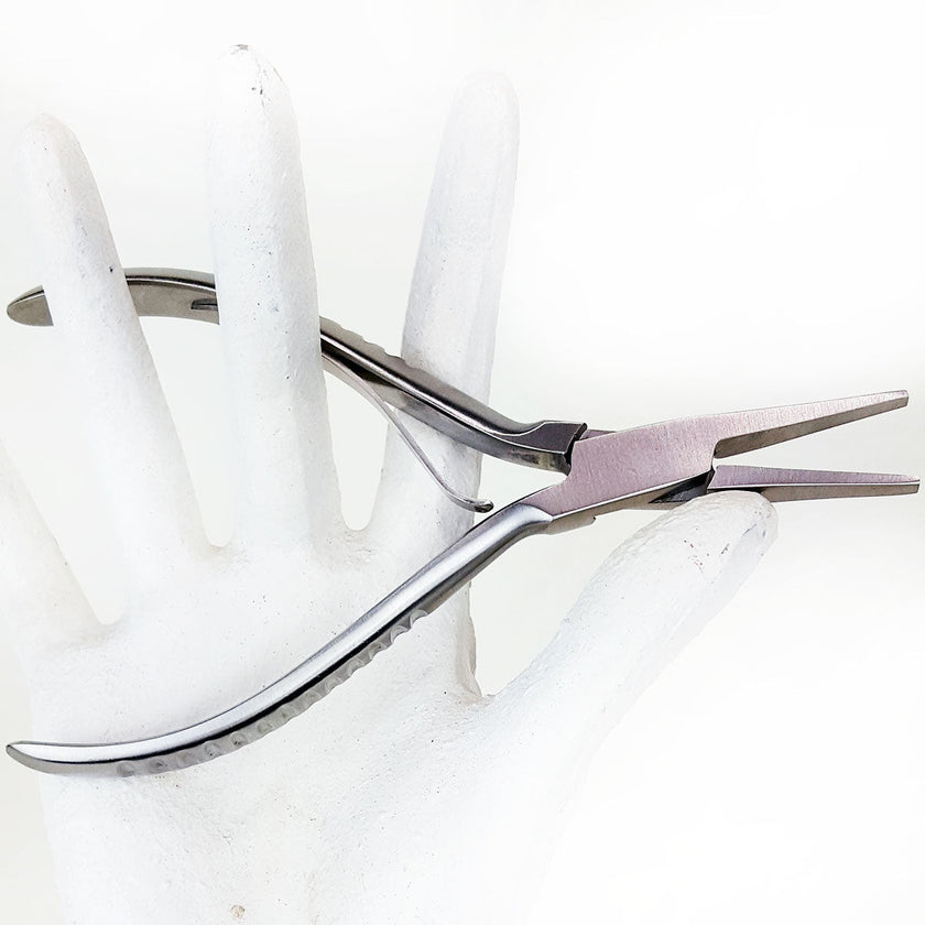 Stainless steel flat glide clamp closer for linkies and microrings in mannequin hand