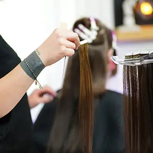 Tape Hair Installation on Client